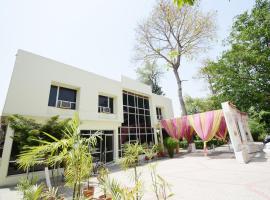 OYO 37159 Hotel Tanveer，位于克勒尔的酒店