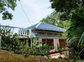 Breeze Guest House，位于亭可马里的带停车场的酒店