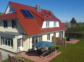 Ferienhäuser Hühnergott und Kranichnest, Sauna, Kamin und Garten，位于布雷格的酒店