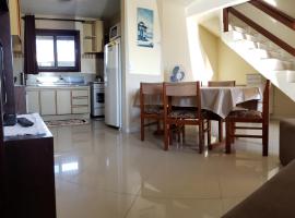 Residencial Hannah - Casa 6 - Porto Belo SC - Bairro Perequê，位于贝卢港的度假屋