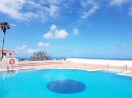 Cosy Well Located Apartment with swimming pool Tenerife，位于塔科龙特的酒店