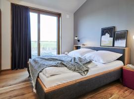 Gud Jard Lodge Nr 27 - Design-Ferienhaus mit exklusiver Ausstattung，位于佩尔沃姆的酒店