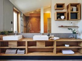 Gud Jard Lodge Nr 28 - Design-Ferienhaus mit exklusiver Ausstattung，位于佩尔沃姆的酒店