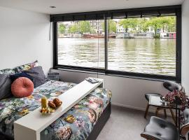 Houseboat Amsterdam - Room with a view，位于阿姆斯特丹韦伯斯特拉特地铁站附近的酒店