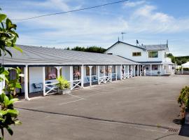 Accommodation at Te Puna Motel，位于陶朗加的度假园