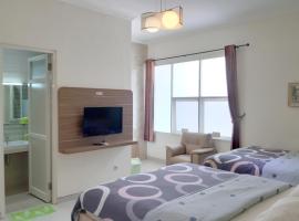 留芳頌生活酒店，位于泗水的旅馆