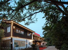 杭州玉榕·西湖别院度假酒店，位于杭州中国茶叶博物馆附近的酒店