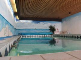 Ferienhaus Abbi mit Schwimmbad und Fitness für 8 Personen, Strand, Norddeich，位于Hage的酒店