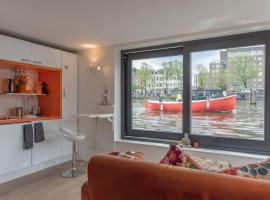 阿姆斯特尔船屋酒店，位于阿姆斯特丹的旅馆