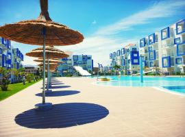 Kariat Cabo - Appartement Charmant, Climatisé avec Vue Piscine，位于卡博尼格洛的酒店