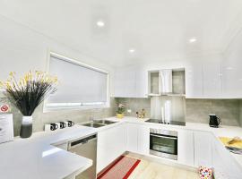 Modern 4-Bedroom House near Singleton CBD Hunter Valley，位于辛格尔顿的酒店