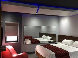 Motel Boutique Xpres，位于恩塞纳达港的酒店