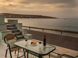 Sunrise Beachfront Apartment，位于锡蒂亚的度假短租房