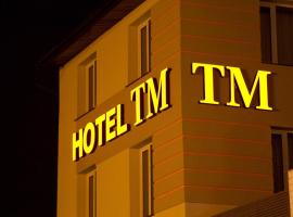 TM酒店，位于拉多姆的酒店