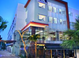 Hotel Neo Candi Simpang Lima - Semarang by ASTON，位于三宝垄阿克马德雅妮机场 - SRG附近的酒店
