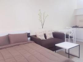 Popular Condo C4，位于暖武里府的酒店