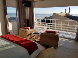 Atlantic Loft - Open plan apartment with Sea Views，位于梅尔克博斯特兰Koeberg Nature Reserve附近的酒店