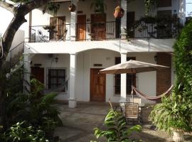 Jardín Café Hotel & Restaurant，位于格拉西亚斯的酒店