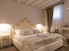 Ca' Vittoria Apartsuite House Chioggia，位于基奥贾的酒店