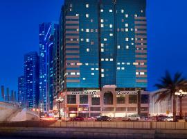 金色郁金香酒店式公寓，位于沙迦的酒店