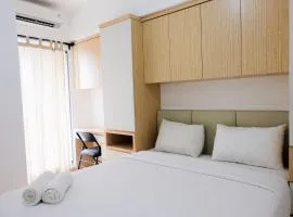 Comfy 2BR Apartment at M-Town Residence By Travelio