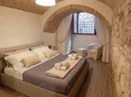Residenza Porta Perlici Assisi Apartment，位于阿西西圣嘉勒圣殿附近的酒店