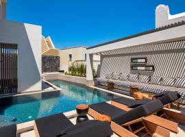 Uma Ray Suites，位于费拉的酒店