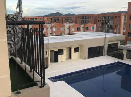 Apartamento vacacional Ibagué，位于伊瓦格的带停车场的酒店