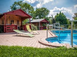 Dunai Gyöngy Vendégház，位于Kisapostag的酒店