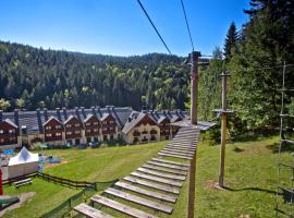 维尔克姆拉滑雪及温泉度假酒店，位于皮夫尼奇纳莫斯尼亚维尔乔姆拉滑雪缆车附近的酒店
