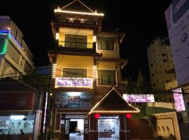 Hongjinding International Hotel红金顶酒店，位于图勒的酒店