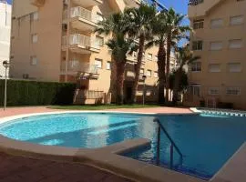 APARTAMENTO CON TERRAZA, VISTAS AL MAR Y PISCINA