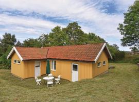 胡尼波斯坦迪一卧室度假屋，位于亨尼博斯特兰德的酒店