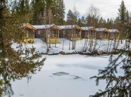 V&aring;lkojan Naturby - Timber cottages，位于韦姆达伦的滑雪度假村