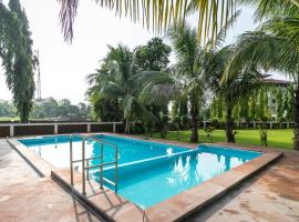 Capital O 46139 Green Valley Resort Suite，位于锡尔瓦萨的酒店