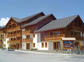 Lagrange Vacances L'Ecrin des Sybelles，位于土绪尔TS德斯拉维勒斯滑雪缆车附近的酒店