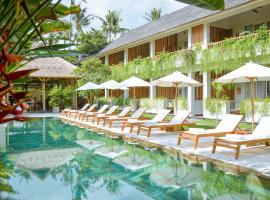 巴厘岛金巴兰迎客酒店，位于金巴兰金巴兰海湾的酒店