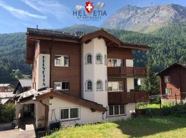 Helvetia Apartments，位于萨斯费斯塔菲尔瓦尔德滑雪缆车附近的酒店