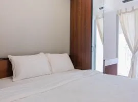 Comfortable 2BR Apartment Serpong M-Town Residence By Travelio