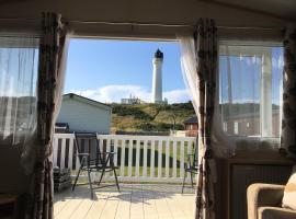 87 Lighthouse View Lodge，位于洛西茅斯的度假短租房