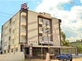 Hotel Ambai Grand，位于Ambāsamudram的酒店