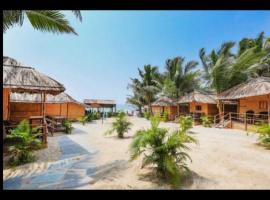 Blue Corner Beach Huts & Restaurant，位于比纳里姆的酒店