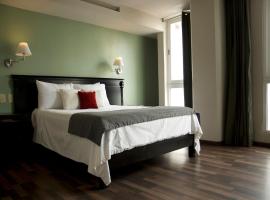卢西塔尼亚套房公寓式酒店，位于奥里萨巴的公寓式酒店