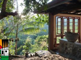 Singharaja Garden AGRO ECO Lodge，位于Pelawatta的木屋