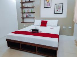 RedDoorz @ Caimito Drive Dampas，位于塔比拉兰的酒店