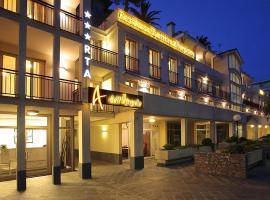德尔安吉罗居所酒店，位于欧斯佩达蒂的公寓式酒店