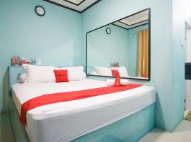 RedDoorz near Mikie Holiday Funland Berastagi，位于不拉士打宜的酒店