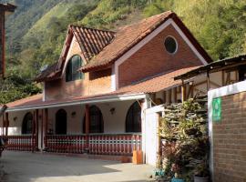 Hotel Boutique Los Pinos，位于伊瓦格的酒店