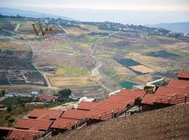 Wooden Arcs Resort & Spa，位于Tal‘at ar Ruzz的酒店