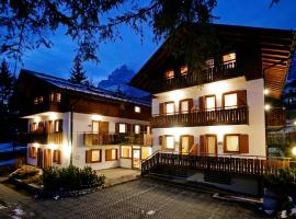 佩妮公寓式酒店，位于圣维托-迪卡多雷多纳利亚滑雪缆车附近的酒店